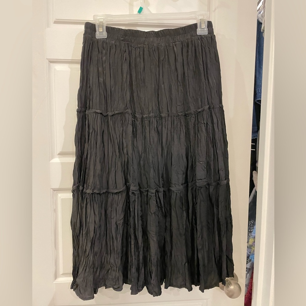 Black crinkle knee length skirt